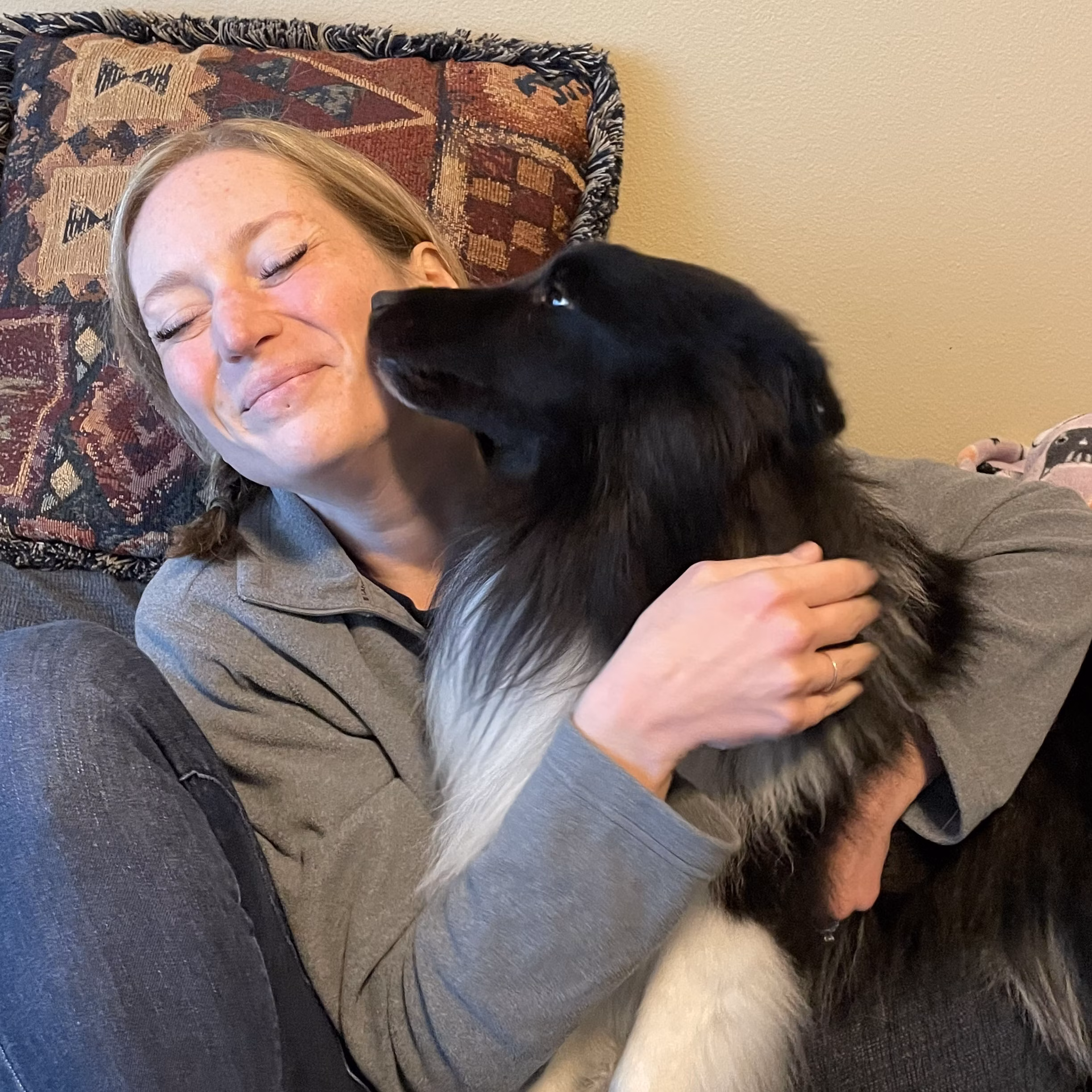 Jamie Freyer and her black and white dog